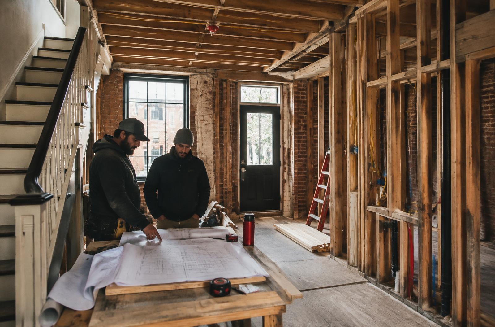 Investors reviewing an active property renovation